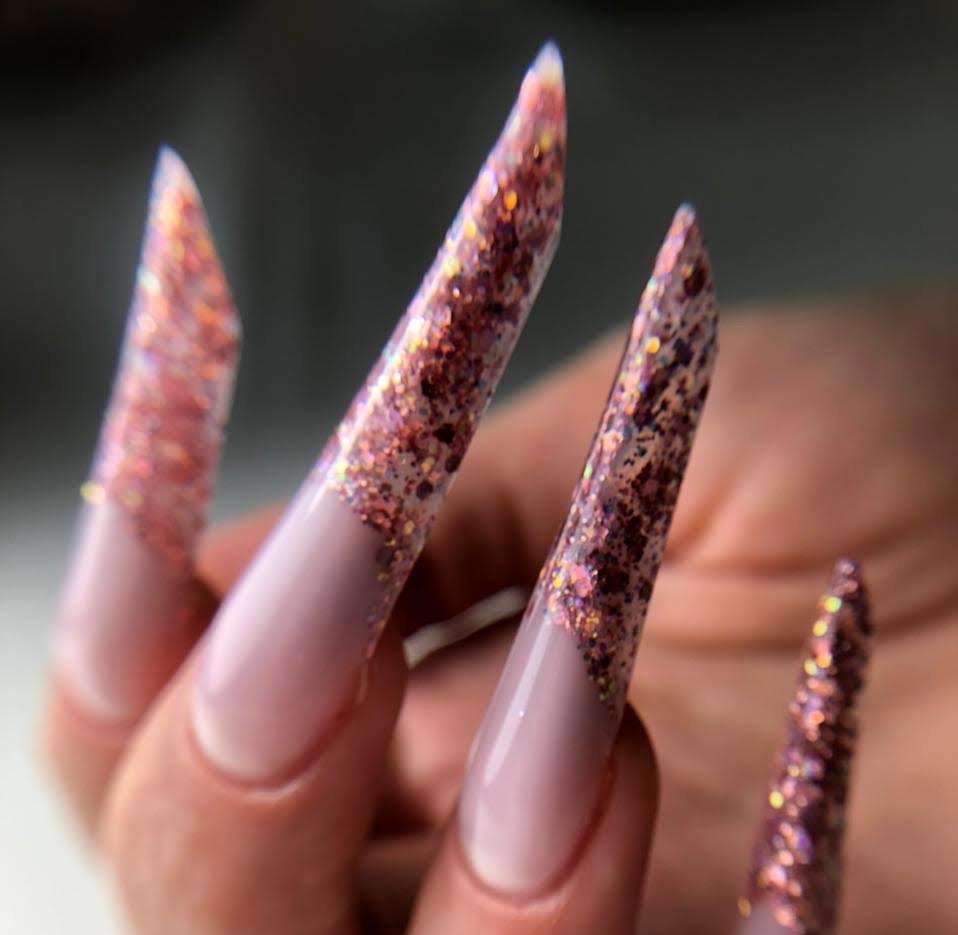 Dark Russian manicure with elegant almond-shaped nails